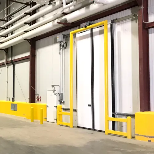 Bi-Parting Flexible Panel Impactable Sliding Doors for Cold Storage Environments
